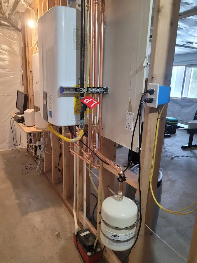Licensed plumber repairing a kitchen sink in Carol Stream